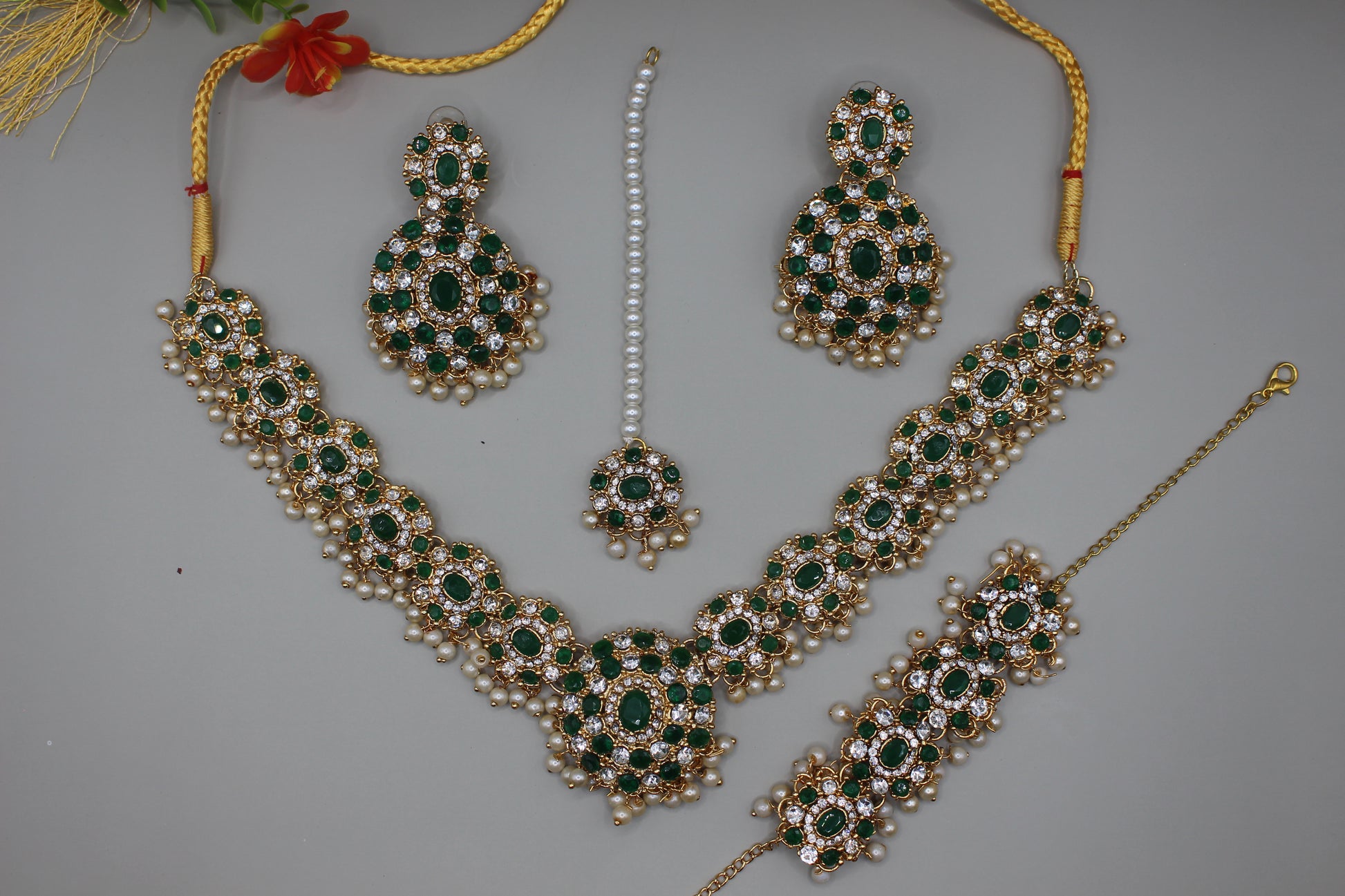 Designers Zircon Necklace Set with Earrings, Bracelet and Tikka