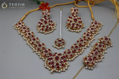 Designers Zircon Necklace Set with Earrings, Bracelet and Tikka