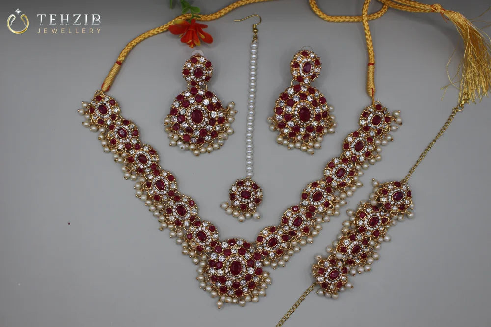Designers Zircon Necklace Set with Earrings, Bracelet and Tikka